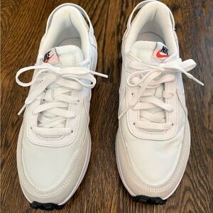 Nike Women’s White Sneakers with Subtle Pink-Orange Tongue Accent